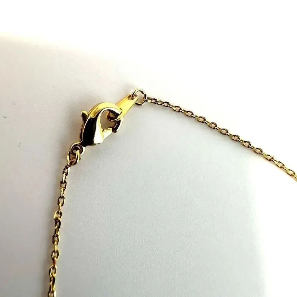 Gold tone XOXO pendant dainty necklace